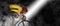 Man racing cyclist on smoke background. Man in yellow cycling jersey