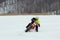 Man racing dirt bike on the ice