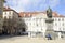 Man reading in a bench in Graz