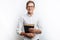 Man reading Bible, white background, book in hand close-up