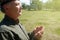 A man reads a muslim prayer in nature