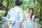 Man ready to give flowers to girlfriend