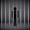 Man with red heart in jail on dark background