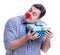 Man with a red nose funny holding a shopping bag gift present is