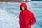 Man in red parka. winter male fashion. warm clothes for cold climate. weather forecast. human and nature. man walking
