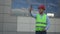 a man in a reflective vest at a construction site