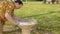 Man refreshing his face with drinking fountain