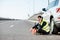 Man with refuel canister near the car on the roadside