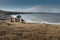 Man relaxing on a bench with a beautiful view on Atlantic ocean