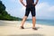 Man relaxing on exotic beach in Seychelles Islands.