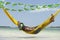 Man Relaxing in Hammock on Brazilian Beach