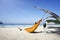 Man relaxing on hammock at tarimbang beach