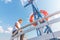 A man relaxing happily on the vacation sailboat yacht having a rest on summer boat and blue sky background