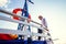 A man relaxing happily on the vacation sailboat yacht having a rest on summer boat and blue sky background