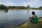Man relaxing by lake