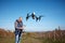 Man remote control drone`s flight