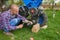 The man removed the wheel from the tractor,a locksmith repairs a two-wheeled tractor in the yard by removing the wheel