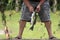 Man Removing Hook from Fish