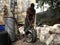 A man removing a tire rim in the caribbean