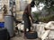 A man removing a tire rim in the caribbean