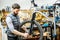 Man repairing a bicycle in the workshop