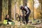 Man repairing bike in park