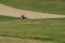 A man repairing a tractor