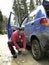 Man resolving a tyre puncture