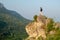 A man is resting on a stand above the Sicevac gorge. Wonderful spring morning