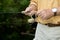 Man retrieving a lure while freshwater fishing