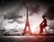 Man on retro bicycle next to Effel Tower, Paris, France.