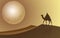 Man ride a camel looking to the full moon at desert