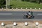 A man rides his motor bike on the highway north of Elephant Pass in Northern Sri Lanka.