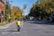 Man riding a bike on Rachel street in Autumn