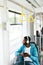 Man Riding In Bus Listening Music In Headphones