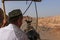 Man riding a donkey cart at the Gaochang ruins near the city of Turpan