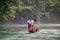 Man Riding Elephant in River. Elephant Drowning in River. Tangkahan