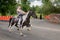 Man riding a horse at Appleby Horse Fair, Cumbria.