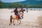 Man riding a horse at Songkhla beach, Thailand