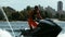 Man riding jet ski in slow motion. Male rider on jet ski. Sportsman on jet ski