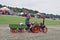 A man riding a mini steam engine