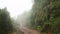 Man riding motorbike in mist, at himalayas