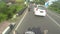 Man riding a motorbike on the road on a tropical island