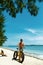 Man Riding Sand Bicycle On Beach. Summer Sport Activity