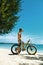 Man Riding Sand Bicycle On Beach. Summer Sport Activity