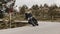 Man riding a Yamaha XSR700 motorcycle in a beautiful road