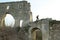 Man rises to the ruins of a fortress in the cave city of Mangup-Kale