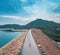 Man in the road, top of the dam of High Island Reservoir, Sai Kung, Hong Kong, outdoor