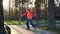 Man on rollers performs various turns and rides between training cones, crossing his legs. Professional roller skate