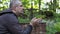 Man with the rosary praying at outdoors